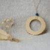 Handmade Ceramic Donut Necklace | Earthy Clay Circle Pendant with Blue Bead Handmade Ceramic Donut Necklace | Earthy Clay Circle Pendant with Blue Bead