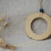 Handmade Ceramic Donut Necklace | Earthy Clay Circle Pendant with Blue Bead Handmade Ceramic Donut Necklace | Earthy Clay Circle Pendant with Blue Bead