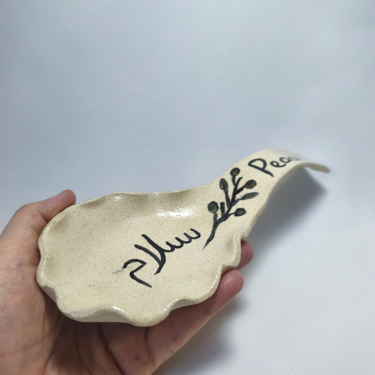 Handmade Ceramic Spoon Rest | Peace & Salam Olive Branch Pottery Handmade Ceramic Spoon Rest | Peace & Salam Olive Branch Pottery