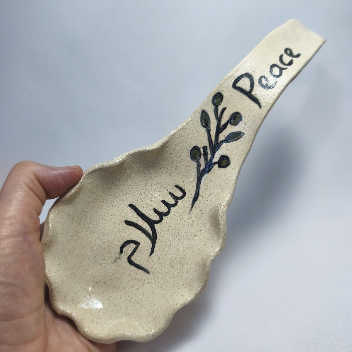 Handmade Ceramic Spoon Rest | Peace & Salam Olive Branch Pottery Handmade Ceramic Spoon Rest | Peace & Salam Olive Branch Pottery
